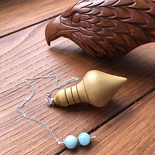 Pendule en buis et aigue-marine