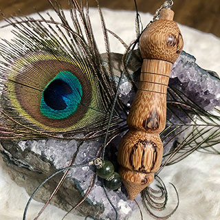 Pendule en bois de serpent (bois exotique)